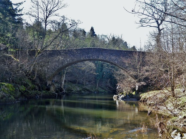 The Hornshole Bridge crosses the River Teviot