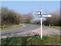 Direction sign and junction at Godshill Cross