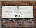 Date stone on the garage