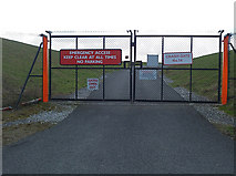 SJ8182 : Emergency access road at Manchester Airport by Anthony O'Neil