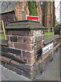 Bench mark on the corner of Vicarage Road