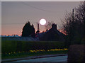 The sun sets over Ashley Village, Cheshire