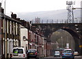 Street, railway viaduct and communications mast