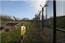 SE6527 : Looking northwards along the footpath and the Drax perimeter fencing by Andrew Whale
