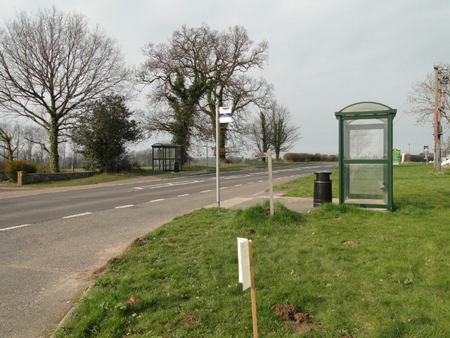 Bus stop shelters on the A140 at Alby