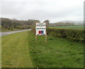 Sign advertising agricultural sale near Five Lanes, Monmouthshire