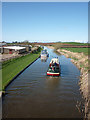 Canal barge heading north past Cabus Nook