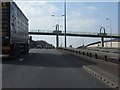 SJ8943 : A50 - footbridge west of Heron Cross by Peter Whatley