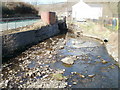 Rhondda Fawr river emerges from under Blaenrhondda Road, Blaenrhondda