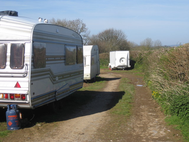 Travellers' encampment along footpath