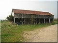 SU6957 : Fine old barn - Lance Levy Farm by Mr Ignavy