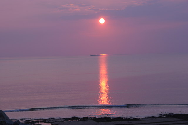 Sunset over Charlie Rock: Borth sea defences