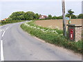 TM2865 : B1116 Dennington Road & Dennington Road Postbox by Geographer