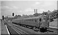 Down suburban electric train passing Honor Oak Park station