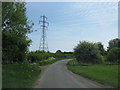 Pylons over the road to Hillesden