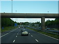 A footbridge over the M62, west of  junction 5