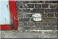 Benchmark on the western parapet of Harrow Road bridge over the Grand Union Canal