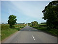 SE9760 : The B1252 Garton Hill (road) towards Sledmere by Ian S