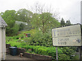 Road sign and garden in Sandbank