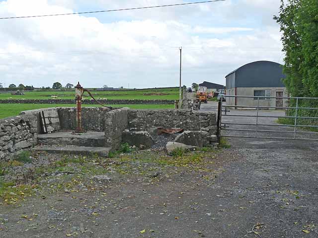 Farm buildings and old pump at Togher