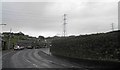 Bus stop, retaining wall and pylon, Sowood near Huddersfield