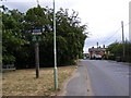 TM3152 : A1152 The Street & Eyke Village Sign by Geographer