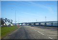 Dundee waterfront roadway with rail bridge beyond