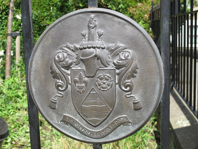 Arms of the former Metropolitan Borough of St. Marylebone on the gates of Violet Hill Gardens