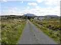 B9327 : Road at Tullaghobegly by Kenneth  Allen