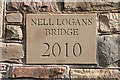 An inscribed stone on Nell Logan