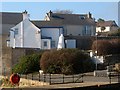 J3719 : Lighthouse at Annalong Harbour by Eric Jones