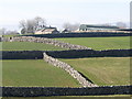 Stone wall enclosed fields and traditional farmhouse west of Sabbath Hill