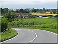 The A366 drops down the hill towards Tucker