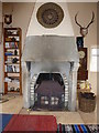 G8676 : Fireplace in 'outhouse' at Salthill Demesne by louise price
