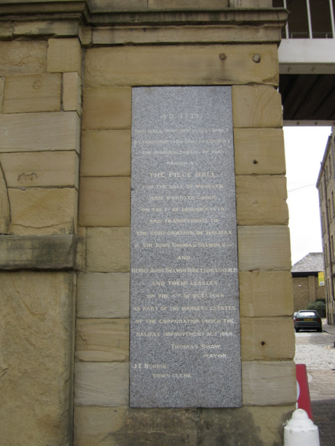 Plaque by The Piece Hall south entrance - east side