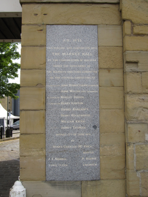 Plaque by The Piece Hall south entrance - west side