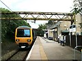 Electric train in Hadfield station