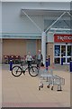 SE6255 : Shopping Trolley and a Bike by Mick Garratt