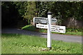 Signpost at Cowbeech Hill