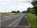 The Thames Path heads north along the A361