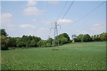 TQ6153 : Pylons crossing an arable field by N Chadwick