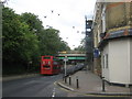 Bus 197 heads towards Railway bridge over Penge High Street