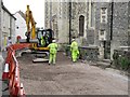 Digger by the church