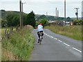 Cyclist heading west on Tewitt Lane