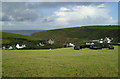 Silage bales and storm clouds