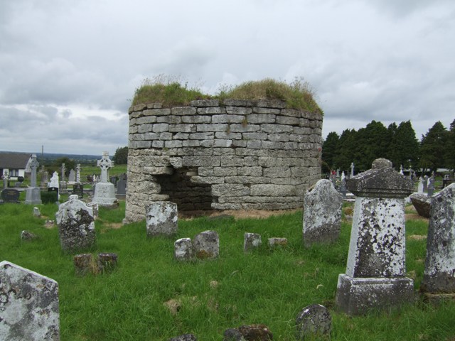 Base of round tower in graveyard