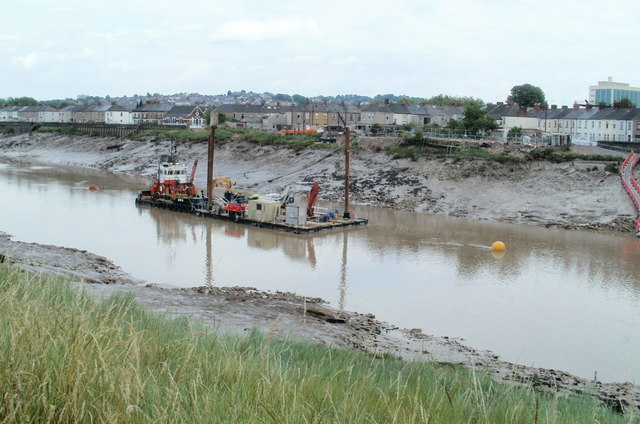 how does a river dredge work