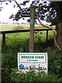 TM4062 : Meadow Farm & Bridleway signs by Geographer