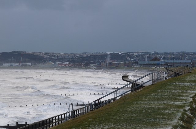 A wintry North Sea lashes Aberdeen beach