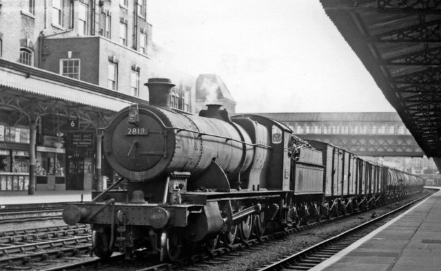 Up freight train passing through Newport High Street station